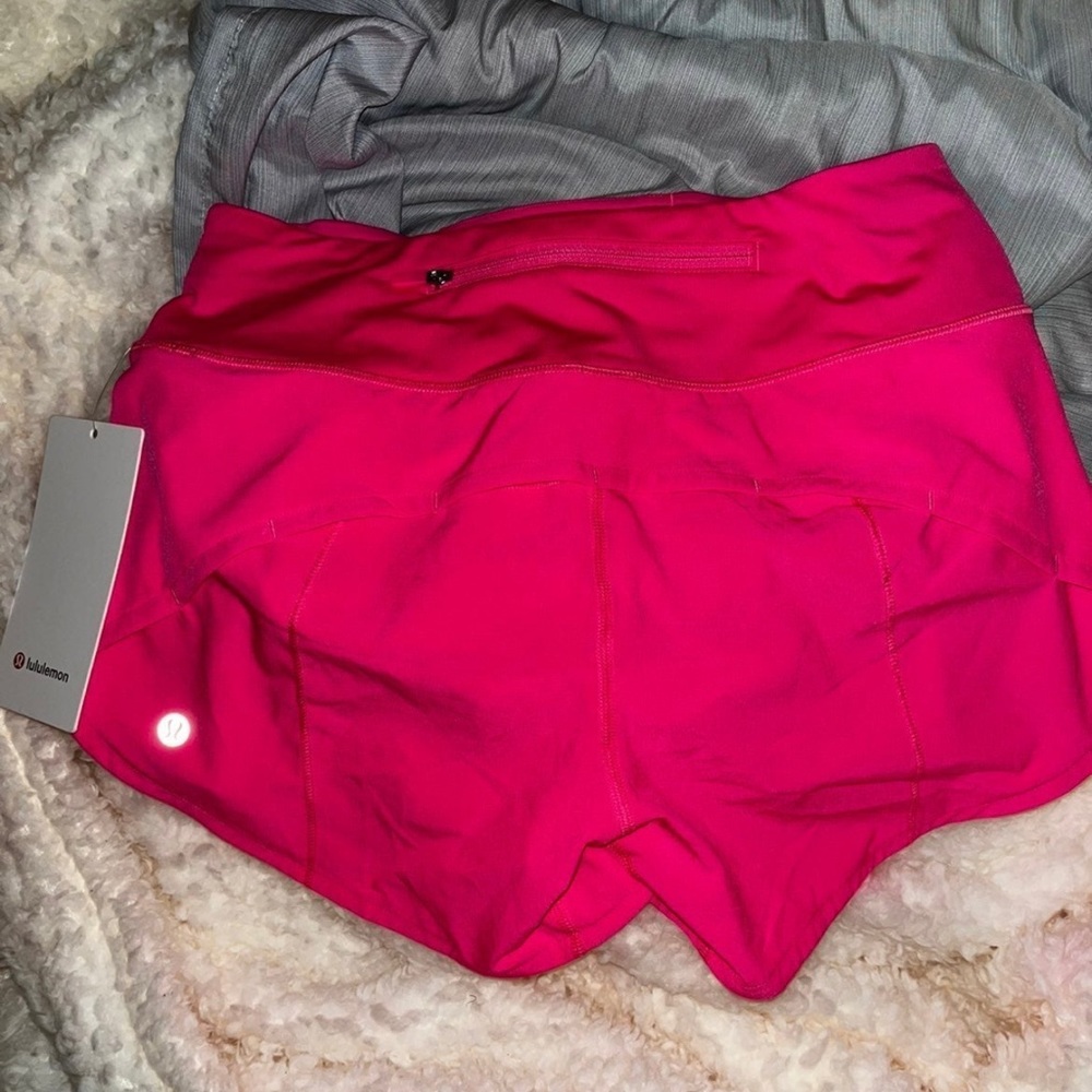 NWT lululemon pink highlight speed ups 4”